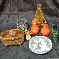Overview of all items in the lot including glassware, trinkets, and jewelry box.