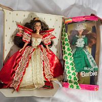 Both Barbie dolls together, one outside box in red and cream gown, another Irish Barbie in original packaging with damage