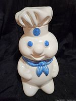 Front view of Pillsbury Doughboy cookie jar showing character details and colors