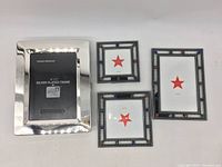 Set of four photo frames: three Macy's frames with decorative colored beads and one 5x7 silver plated F.B. Rogers frame