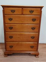 Front view of the 6 drawer solid maple chest showing drawer fronts, handles, and overall structure