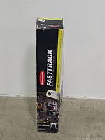 Photo of Rubbermaid FastTrack 6-pack storage rails boxed packaging showing brand and product line.