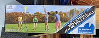 Box of EastPoint volleyball net game set, showing image of four players and branding