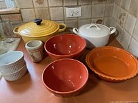 Overview of all items in the lot on a kitchen counter.