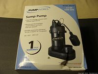 Box of PumpWorks SPX33T sump pump showing model, horsepower (1/3 HP), and capacity (3200 GPH) with warranty info.