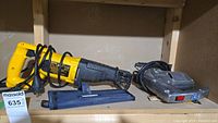MorPower Sabre saw and Dewalt reciprocating saw with cords coiled, showing overall condition and form factor.