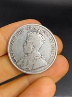 Obverse side showing King George V portrait and inscription
