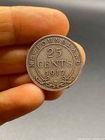 Front side showing '25 CENTS 1917 NEWFOUNDLAND'