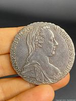 Obverse side of a 1780 Dutch silver coin showing a woman in profile with surrounding inscriptions.