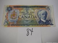 Front side of the 1972 Canadian $5 bill showing Sir Wilfrid Laurier and serial number S08111044.