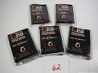 Five sealed packs of 1991-92 NHL Pro Set Series 1 hockey cards angled on white background.