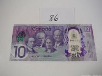 Front side of the 2017 Canadian $10 polymer bill showing portraits of four historical figures and security features.