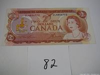 Front side of the 1974 Canadian $2 bill showing Queen Elizabeth II portrait and serial number UL4856772.
