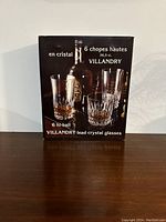 Front of the original box showing six Villandry lead crystal hi-ball glasses with bottle illustration and capacity details in French and English.