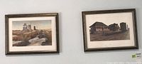 Wide view of two framed prints on a wall, showing both the grain elevators and train station prints.