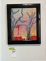 Framed original painting showing abstract tree figures with red and blue accents on a colorful background.