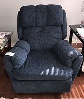 Front view of navy chenille recliner chair in upright position