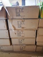 Boxes stacked, each labeled with model WL-303-ICAT and quantity of 6 pieces per box