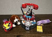 Overview of all toys and Dr. Seuss Cat in the Hat telephone showing condition and item variety.