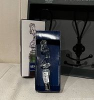 Crystal golfer wine bottle stopper in original box standing upright