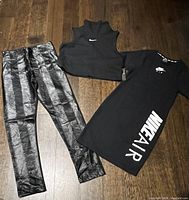 Lot contents showing all three clothing items: faux leather front pants, black sleeveless crop top, and Nike Air dress