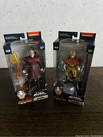Front view of the two boxed figurines featuring Zuko and Aang from Avatar: The Last Airbender.