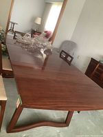 Top surface of fully extended table showing two leaves and overall finish