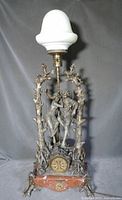 Full view of bronzed spelter lamp with etched glass shade and marble base