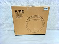 Box of ILIFE robotic vacuum cleaner showing brand name and product illustration on cardboard packaging.