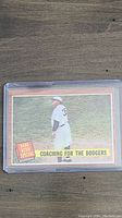 Front side of the baseball card showing Babe Ruth in a white Dodgers uniform with the label 'Babe Ruth Special' and 'Coaching for the Dodgers'.