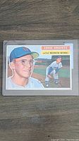 Front of 1955 Topps Ernie Oravetz baseball card showing portrait and action images with team and player name