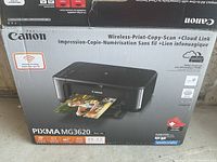 Original box of Canon PIXMA MG3620 wireless printer showing product image and feature highlights including print, copy, scan, and cloud link.