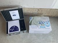 SereneLife Foot Spa unit in protective case with manual displayed, missing power cord and infrared waist belt