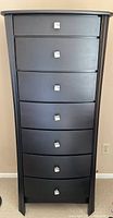 Front view of the tall lingerie dresser showing all 7 drawers with square silver handles.
