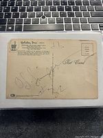 Front of vintage Holiday Inn West motel postcard signed by O.J. Simpson with legible autograph and number 32