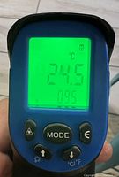 Front view of the Mastercraft temperature reader showing the LCD screen displaying a temperature reading (24.5°C).