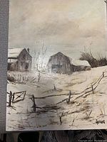 Front view of winter landscape painting with barns and fence in snow.