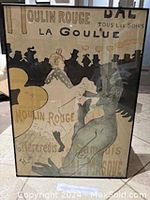 Framed Toulouse-Lautrec Moulin Rouge poster lithograph showing dancers and lettering.