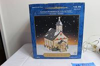 Photo showing original box of Santa's Workbench Collection Classic Series Chapel of Hope with product image and pricing details.