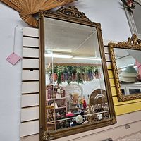 Full frontal view of the rectangular antique mirror showing its size and frame design.