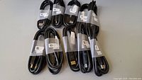 Top view of 10 DisplayPort cables bundled individually with twist ties showing the full length.