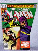 Front cover of The Uncanny X-Men #142 showing Wolverine and sentinel fight scene with bold text 'This Issue: Everybody Dies!'.