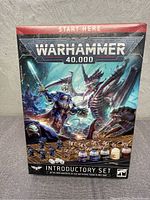Front-facing photo of sealed Warhammer 40,000 Introductory Set box showing artwork and text.