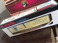 Lionel Gilbert Reefer model train car in original box taken from an angle to show the side and box details