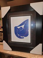 View of framed Henri Matisse Blue Nude print front showing full frame with corner protectors