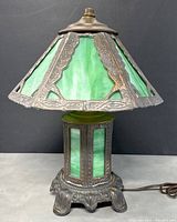Full front view of lamp unlit on gray background
