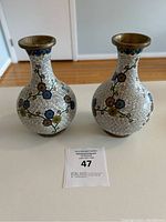 Pair of vases front view on tabletop
