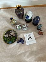 Photo showing the entire set of cloisonne enamel brass decorative items including vases, eggs, apples, dish, and frog figurine.