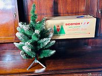 Full view of tree and original box showing overall size and condition