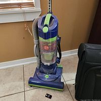 Full view of the Hoover Power Max vacuum cleaner showing overall condition and design.